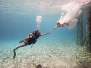father and son underwaterphotoshoot bonaire